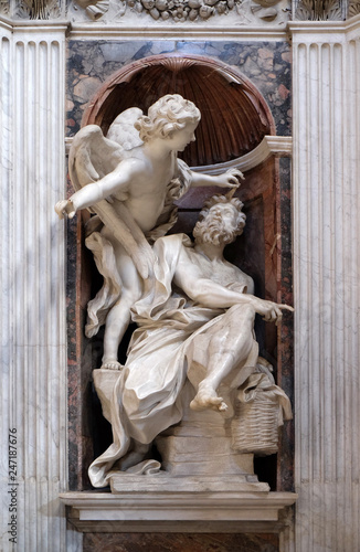 Habakkuk and the Angel marble statue by Lorenzo Bernini in The Chigi chapel in Church of Santa Maria del Popolo, Rome, Italy