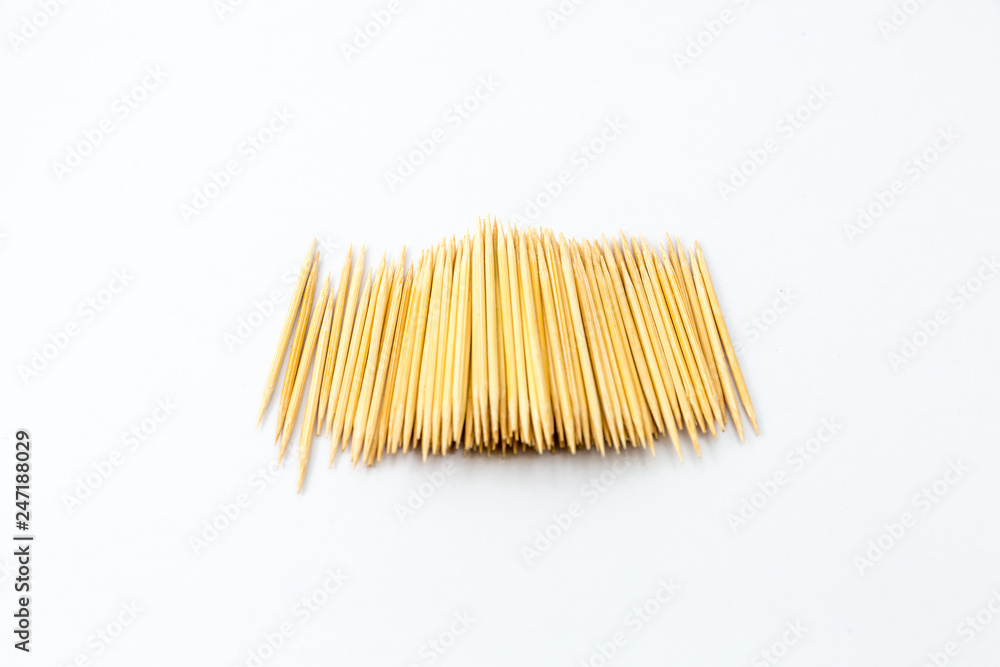 Wooden Toothpicks Isolated on a White Background Wooden Toothpicks Isolated on a White Background