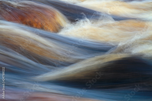 Water flowing strongly in finnish rapids