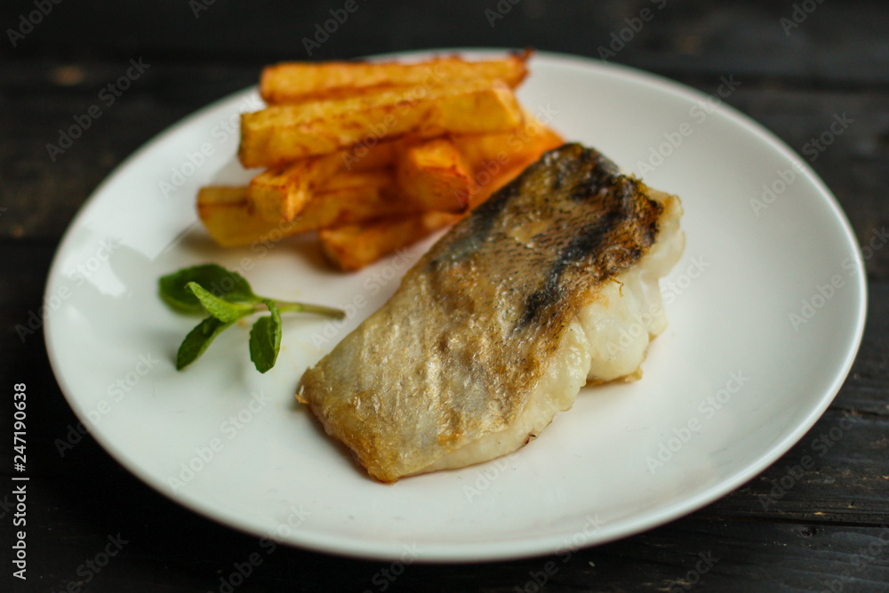 Fish and Fries (white fish with salmon, portion). food background. copy space Fish and Fries (white fish with salmon, portion). food background. copy space
