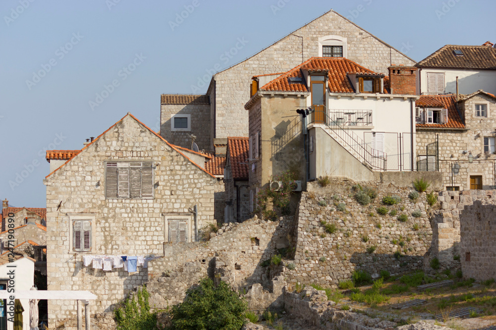 DUBROVNIK, CROATIA - AUGUST 22 2017: Ancient houses in Dubrovnik, Croatia DUBROVNIK, CROATIA - AUGUST 22 2017: Ancient houses in Dubrovnik, Croatia