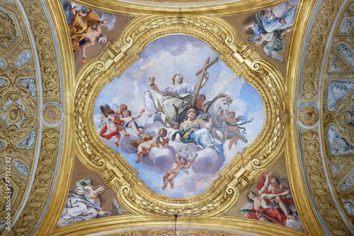 The fresco of virtues on the little cupola of side nave in Basilica dei Santi Ambrogio e Carlo al Corso by Pio Paolini from (1678 - 81), Rome, Italy
