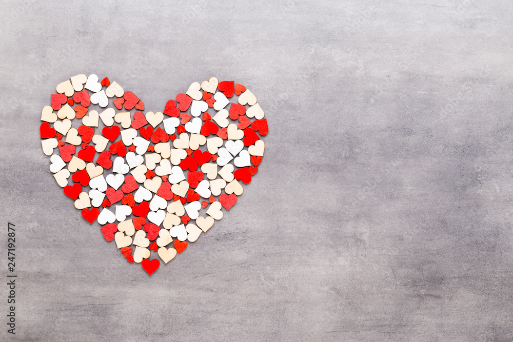Obraz premium Happy Valentines day background. With small hearts on gray background.
