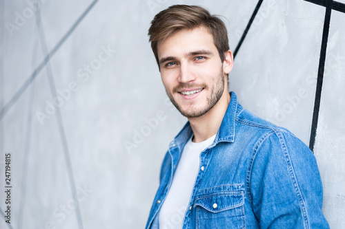 Perfect man. Portrait of happy fashionable handsome man in jeans shirt.