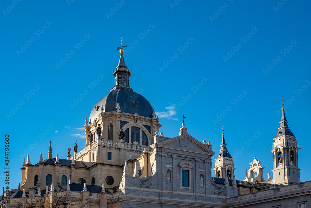 Dome of the famous Almudena Cathedral, a mixture of architectural styles, in Madrid, Spain