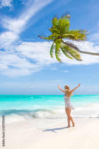 Blonde woman on the tropical beach