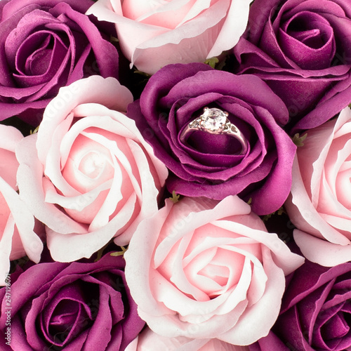 Valentine's day concept. Engagement ring in pink rose, Declaration of love. Top view, macro, close up