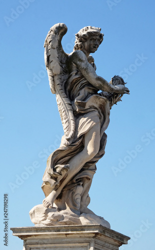Statue of Angel with the Crown of Thorns by Gian Lorenzo Bernini  Ponte Sant Angelo in Rome  Italy 