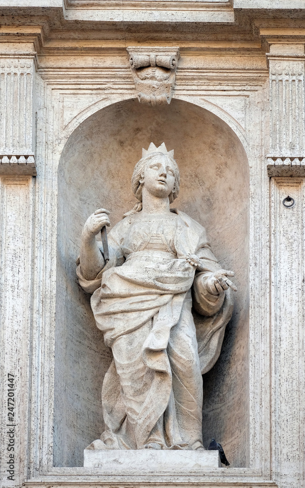 Saint Clotilde queen of the Franks statue on the facade of Chiesa di San Luigi dei Francesi - Church of St Louis of the French, Rome, Italy 