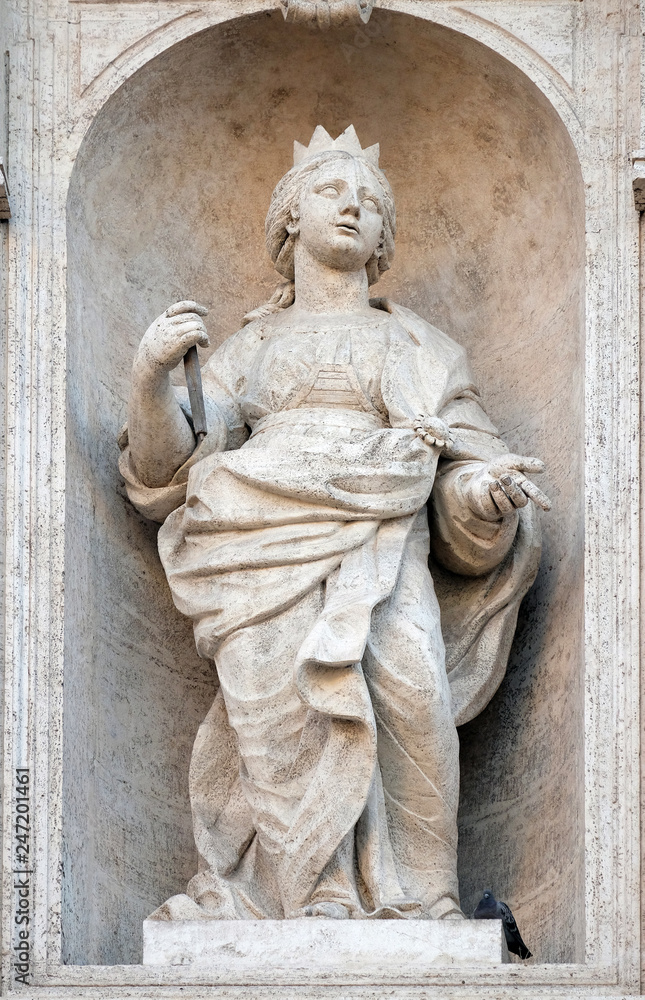 Saint Clotilde queen of the Franks statue on the facade of Chiesa di San Luigi dei Francesi - Church of St Louis of the French, Rome, Italy 