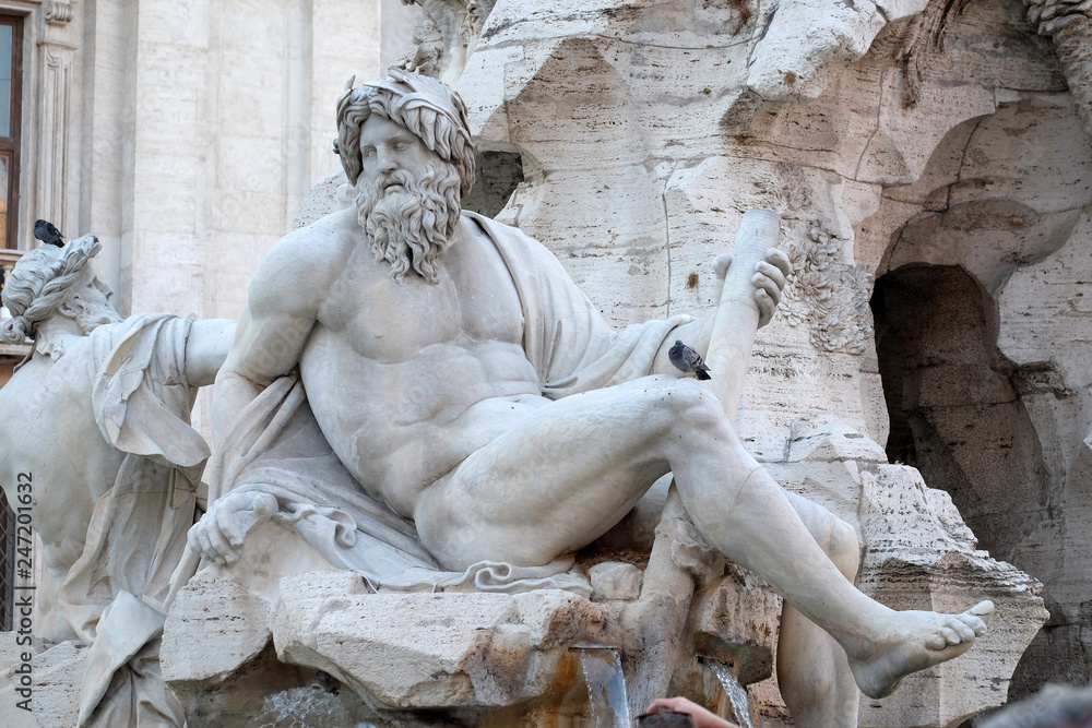 Piazza Navona, Fountain of the Four Rivers detail showing the river-god Ganges by Gian Lorenzo Bernini, Rome, Italy Piazza Navona, Fountain of the Four Rivers detail showing the river-god Ganges by Gian Lorenzo Bernini, Rome, Italy