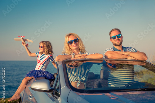 Happy family travel by car © Sunny studio
