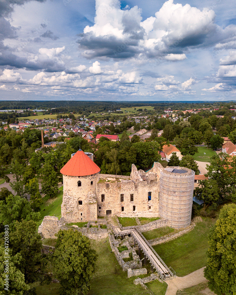 Aerial Photo of Cesis Castle in Latvia, Europe on Sunny Autumn Day, Dramatic Sky, Concept of Travel in Harmony and Peace