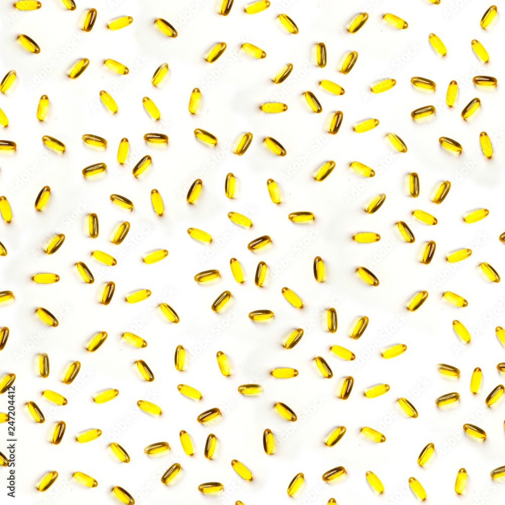 Omega-3 fish fat oil capsules on a white background. Omega-3 fish fat oil capsules on a white background.