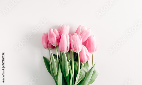 Fototapeta Naklejka Na Ścianę i Meble -  Flowers composition romantic. Pink flowers tulips on white background. Wedding. Birthday. Happy woman's day. Mothers Day. Valentine's Day. Flat lay, top view, copy space