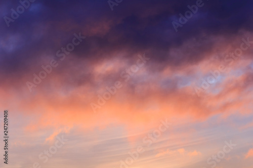 Beautiful sunset sky, background. Purple clouds