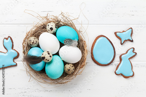 Easter eggs and cookies photo