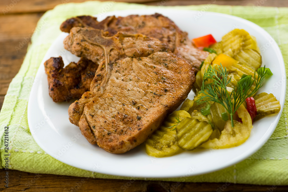 roasted pork chop and salad of cucumbers