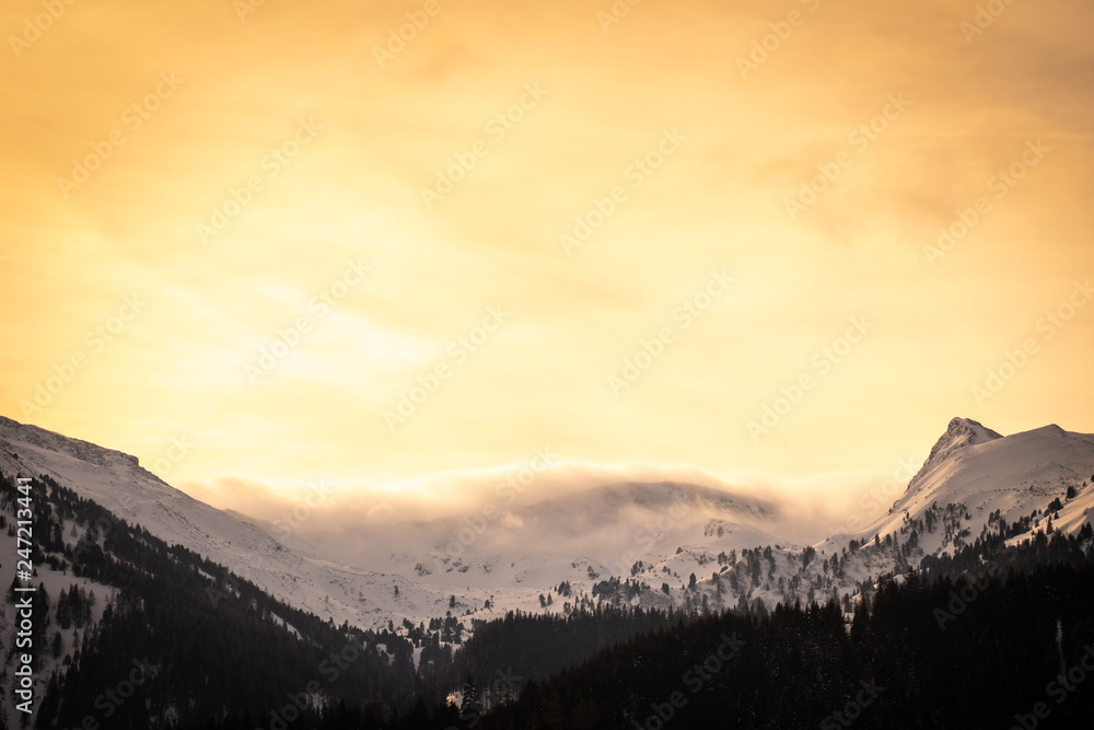 View from Hohentauern to sunset over mountains Lackneralm and Schüttnerkogel