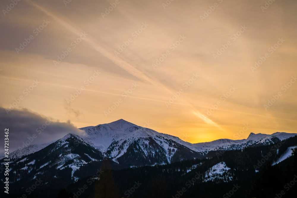 View from Hohentauern to sunset over mountains Bruderkogel, Steinermandl, Schafgupf