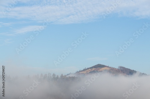 View from mountains with cloudy inversion below. Slovakia © Valeria