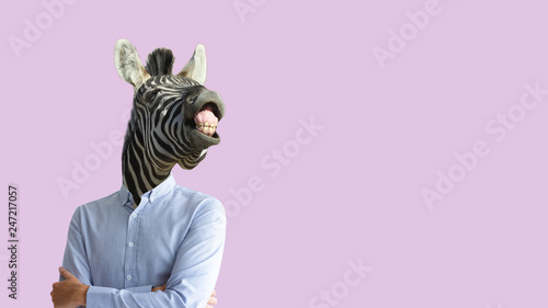Contemporary art collage. Funny laughing zebra head on human body in business shirt. Clip art, negative space. photo