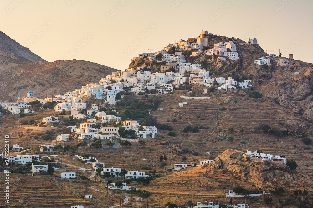 Chora, the main town of Serifos island. The whitewashed village on rocky peak at sunset time. Cyclades, Greece