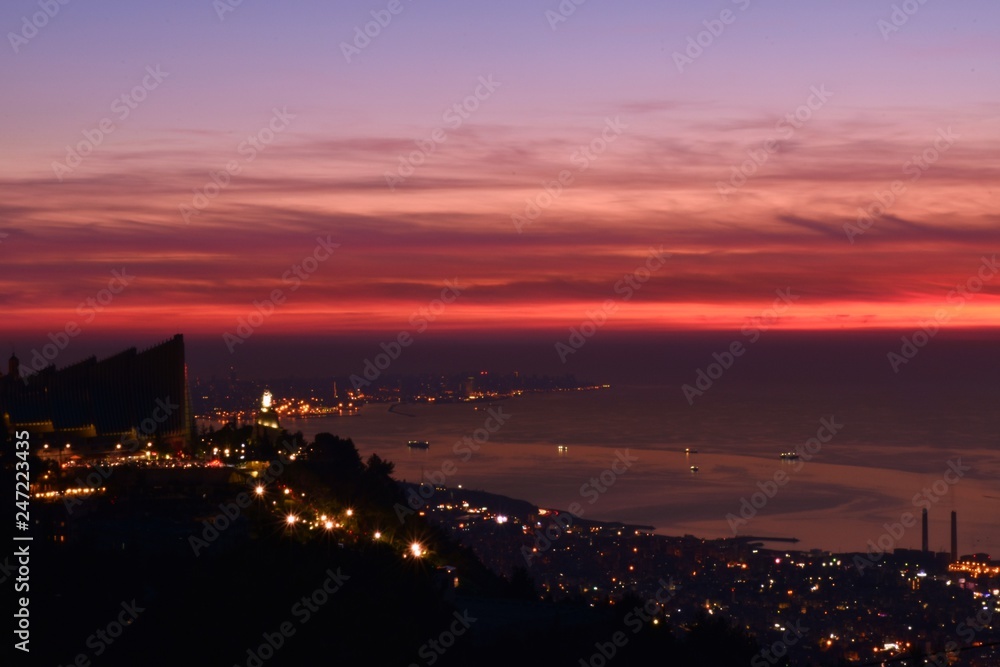 dramatic dusk over mediterranean sea and Beirut shot from Harissa, Mount Lebanon