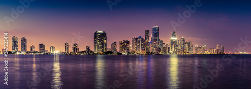 Miami downtown panorama at night, Florida. Reflections in water