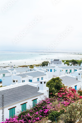 The picturesque coastal town Paternoster with its white houses by the beach on the Western Cape of South Africa