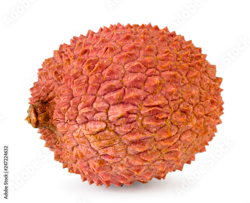 One ripe lychee on a white, isolated.