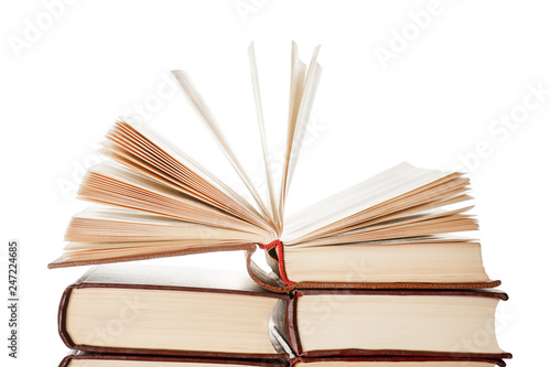 Open book on top of the boo...