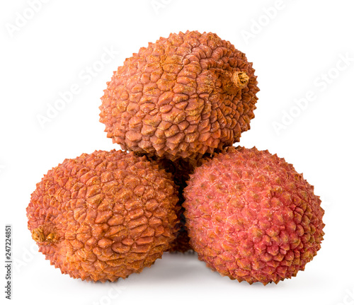 Heap of ripe lychees close up on a white. Isolated.