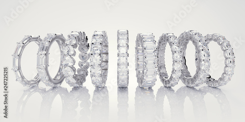 Multiple diamond eternity rings on white background