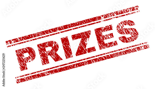 PRIZES seal print with corroded texture. Red vector rubber print of PRIZES text with unclean texture. Text caption is placed between double parallel lines.