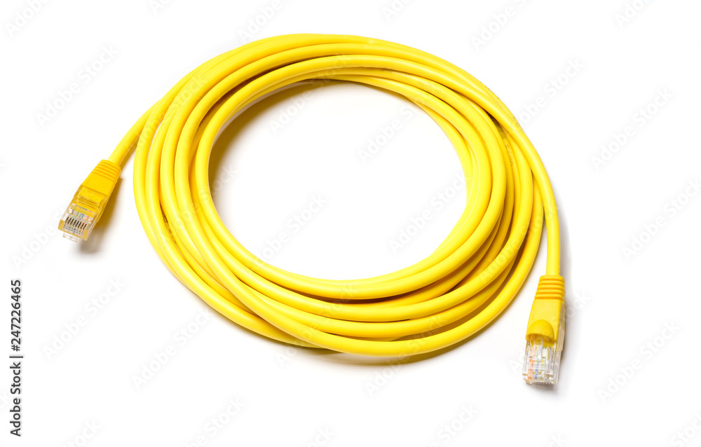 Isolated yellow patch cord internet cable on white background Isolated yellow patch cord internet cable on white background