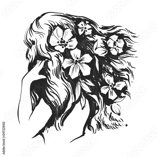 Beautiful woman with flowers and long hairs