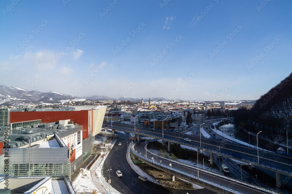 Obraz premium Roofs of houses covered by snow during winter. Slovakia