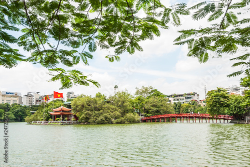 The huc bridge in the Hoan Kiem lake, Hanoi, Vietnam photo