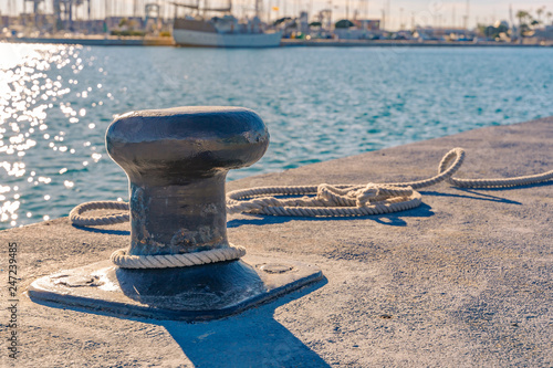 Bild auf Leinwand Ship bollard and rope. Harbor.