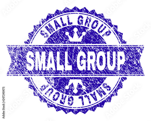 SMALL GROUP rosette seal overlay with grunge texture. Designed with round rosette, ribbon and small crowns. Blue vector rubber print of SMALL GROUP caption with retro texture.