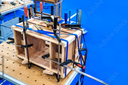 Carpenter work. Gluing the ...
