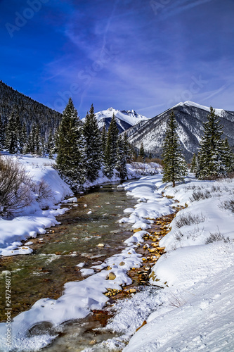 Wallpaper Mural Mountain stream with fresh snow on sunny day Torontodigital.ca