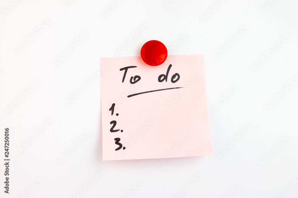 Motivation sticker on a magnetic board with plan to do sign, written with marker Motivation sticker on a magnetic board with plan to do sign, written with marker