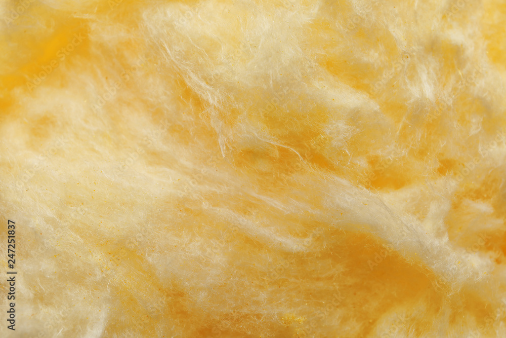 Fluffy yummy cotton candy as background, closeup Fluffy yummy cotton candy as background, closeup