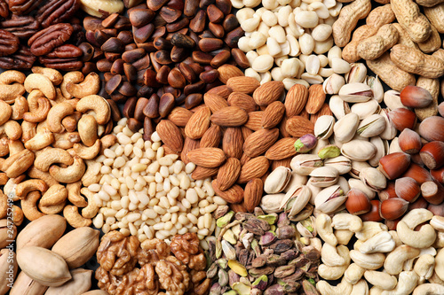 Organic mixed nuts as background, top view