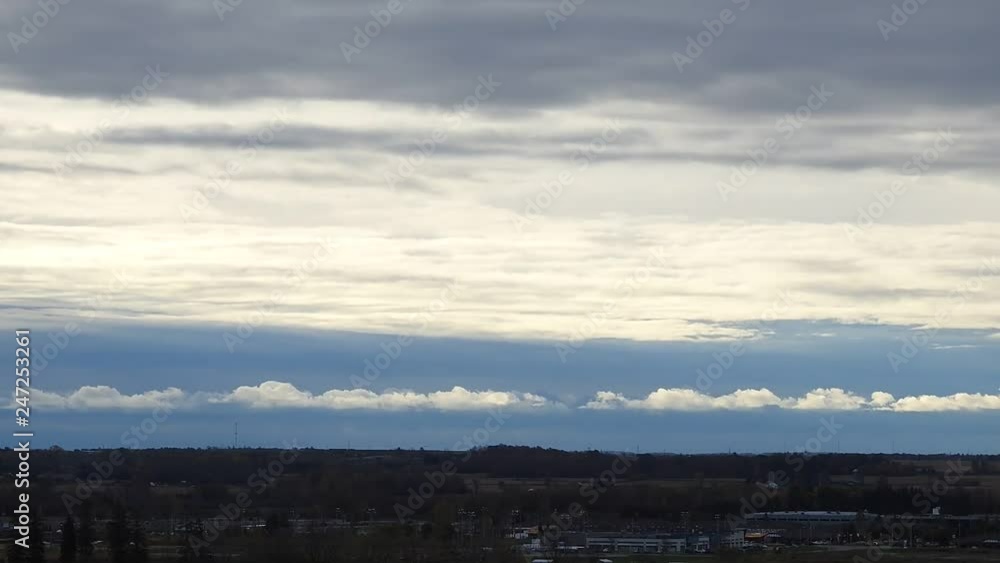 Timelapse Bright White Clouds In Blue Sky Moving Over City And Fields And Forests Timelapse Bright White Clouds In Blue Sky Moving Over City And Fields And Forests