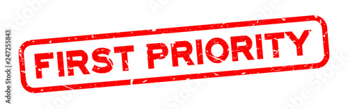 Grunge red first priority word square rubber seal stamp on white background
