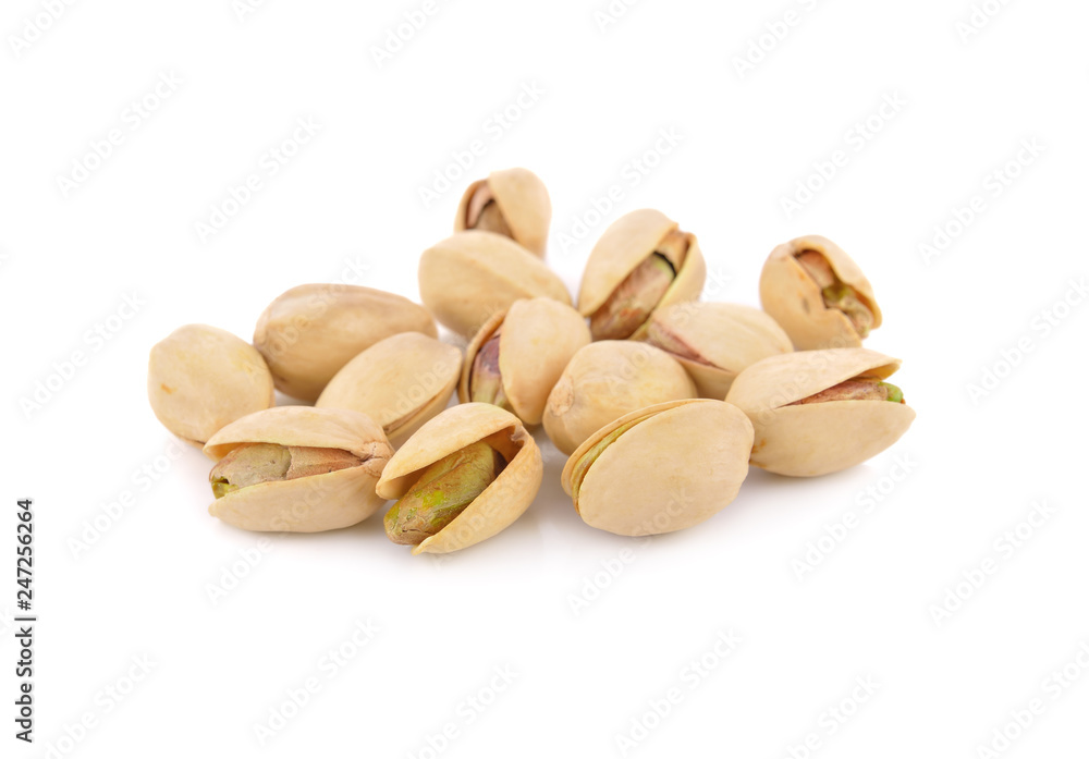 Fototapeta premium dried pistachios on white background