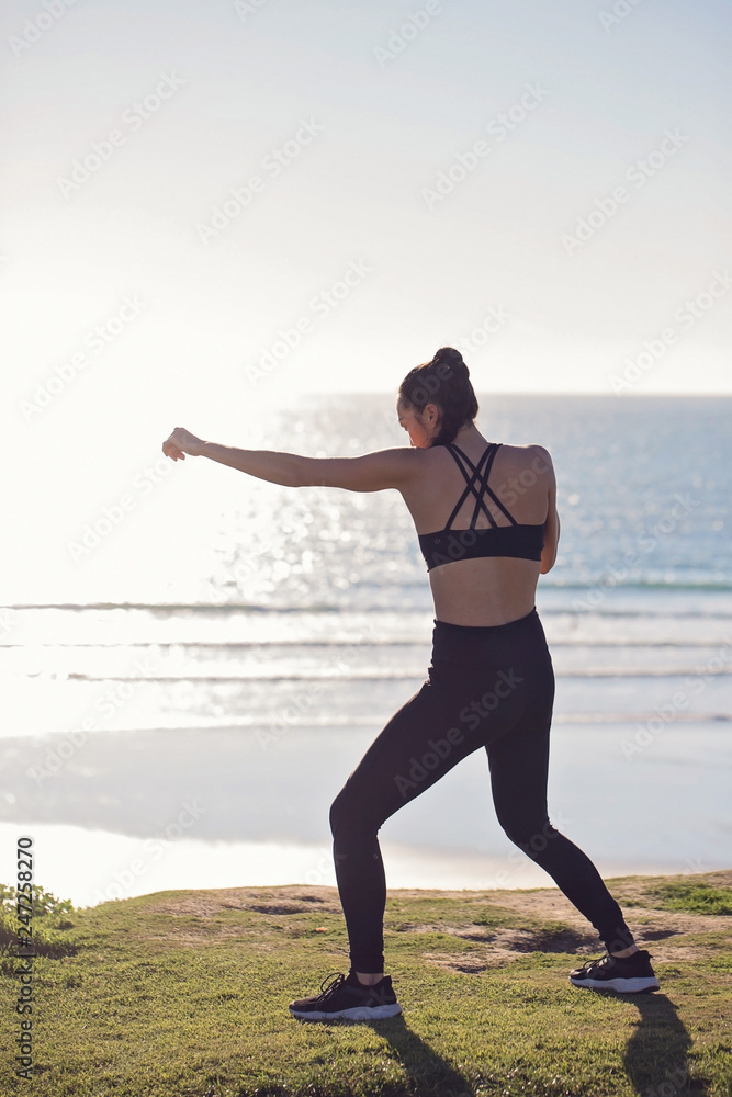Fototapeta premium Woman dancing on the beach